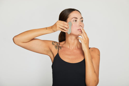 compra gua sha de acero inoxidable